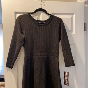 Knit, long sleeve Nina Leonard sweater dress. Size small. New with tags.